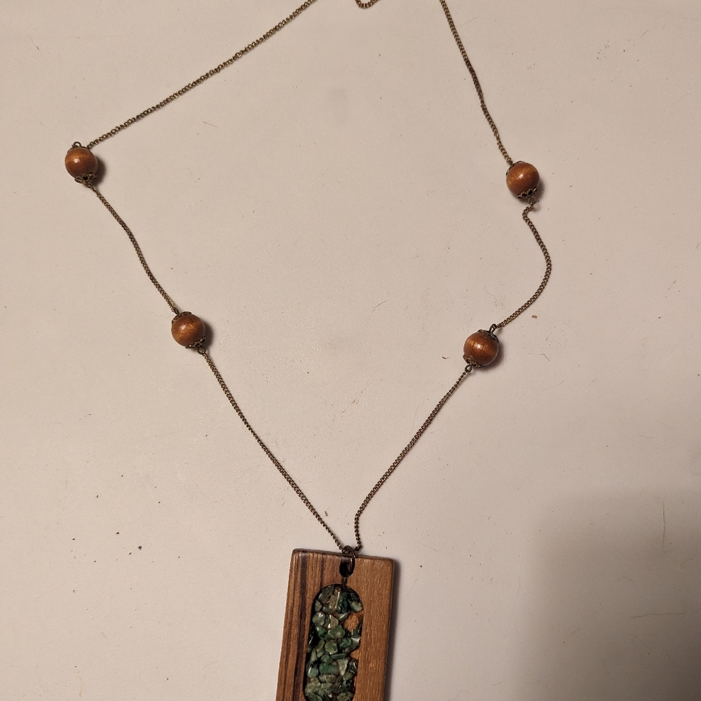 Necklace with wood and inclusions
